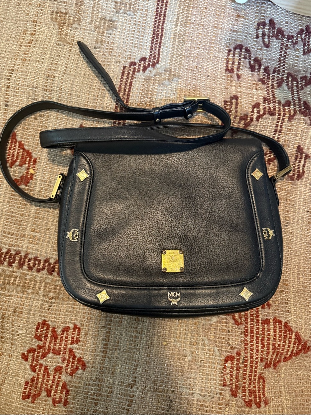 MCM Black Leather Crossbody with Gold Accents